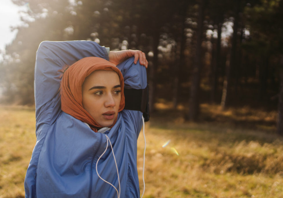 Portrait of a young woman with a hijab ready to do some sports