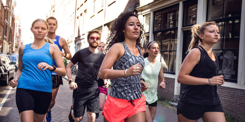 Urban runners crew training in the city in Amsterdam, Netherlands.